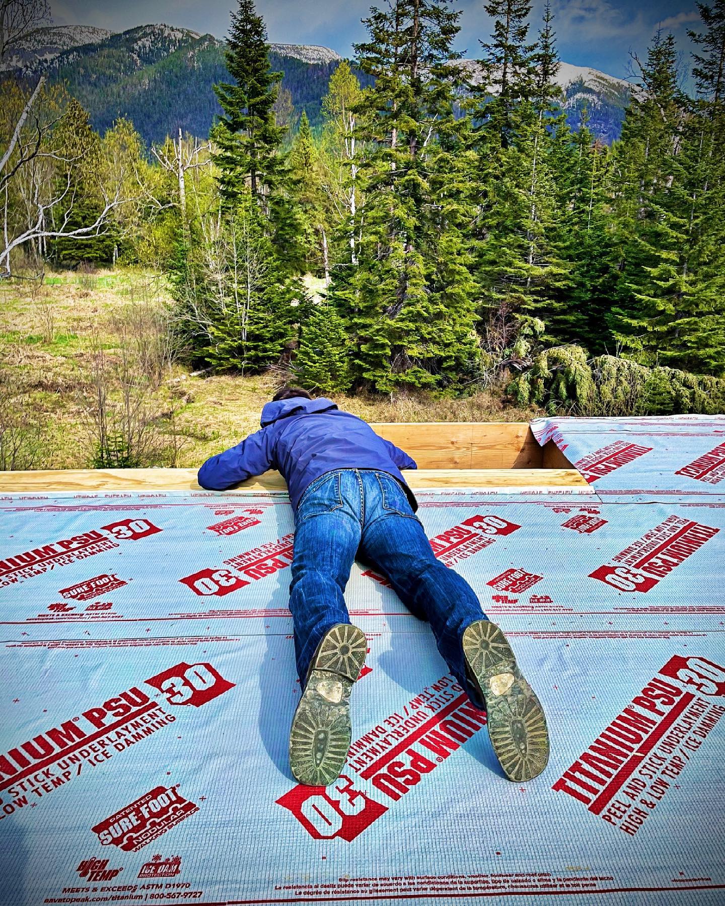 Builder shot of the day...checking out the roof line whitefish custom home builder