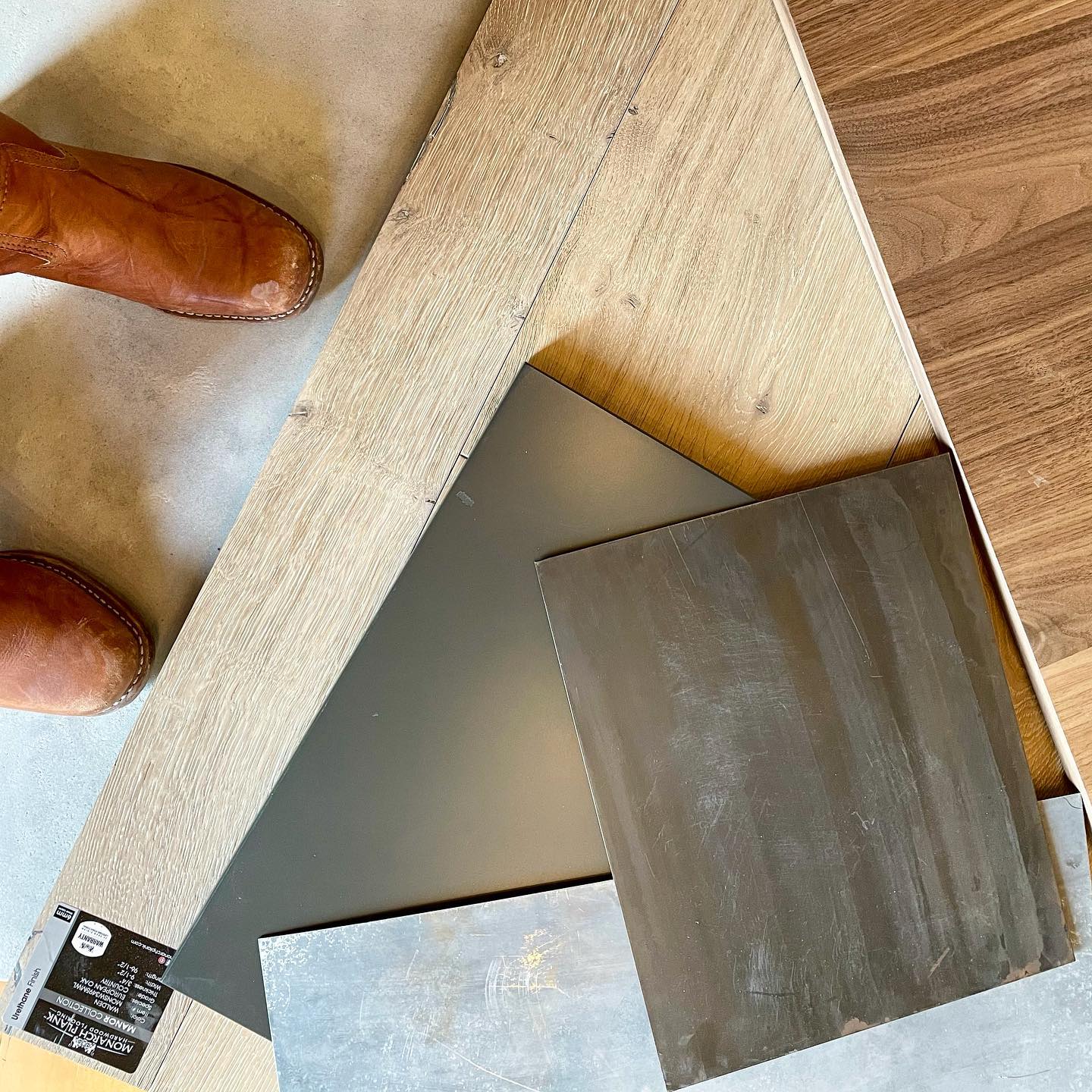 Color pallet of the day...whitewashed oak flooring, iron ore and rustic walnut cabinets, gun-blued steel hood, zinc countertops (and Frye boots ) @awiwoodworks @cmtfabrication whitefish custom home builder